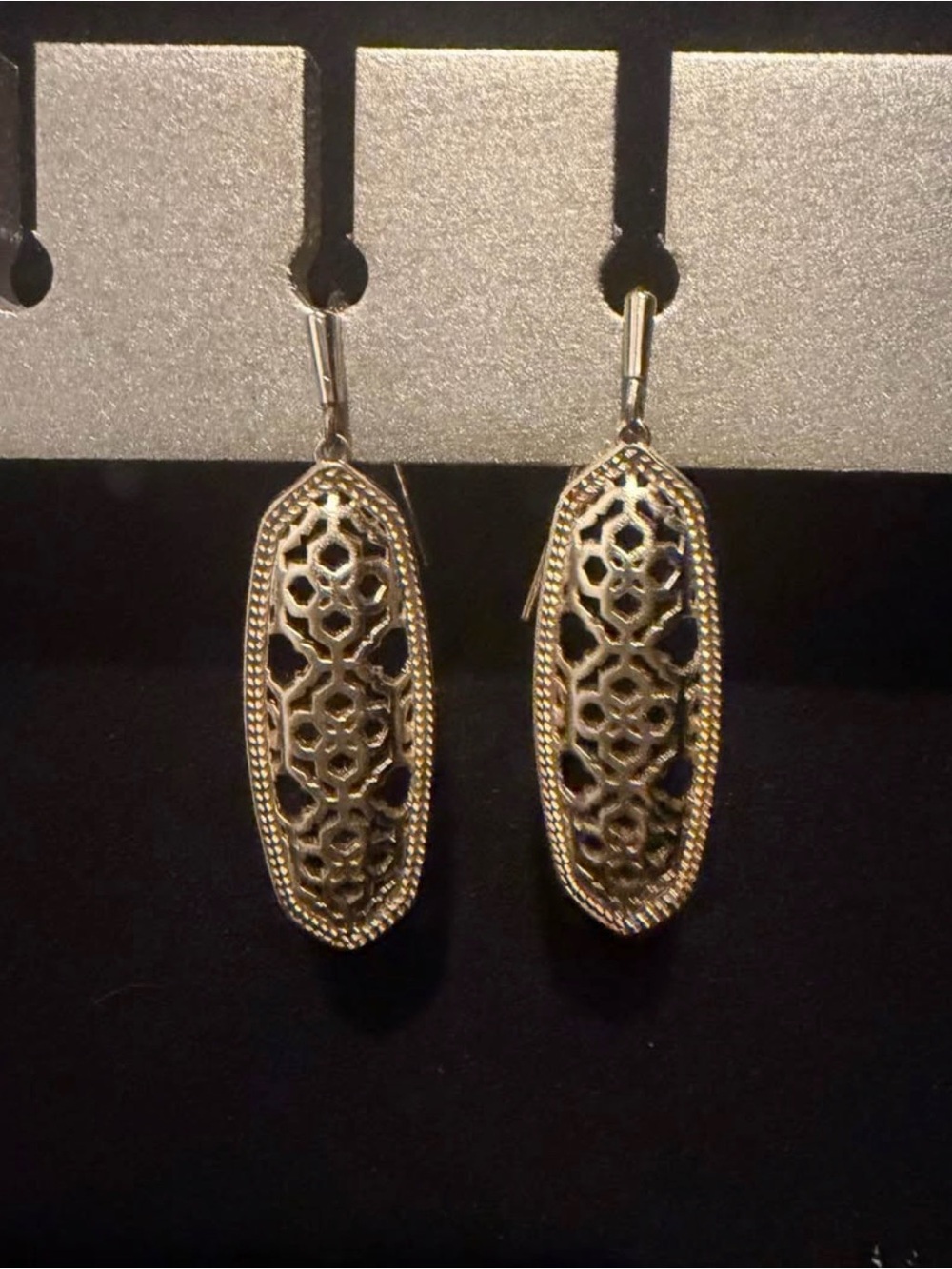 Kendra Scott earrings and necklace